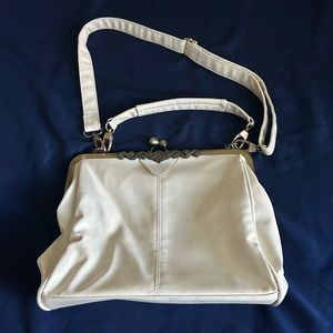 Cute cream purse with kisslock top